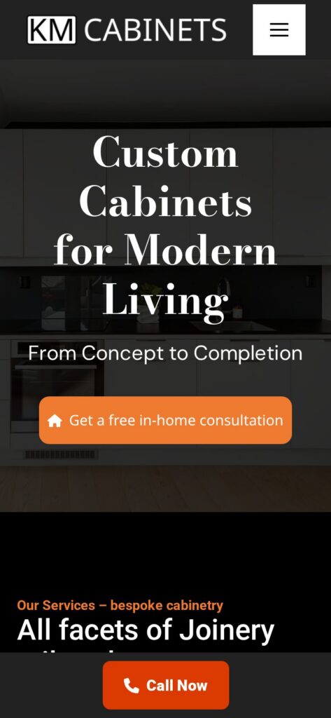 KM Cabinets website on a phone